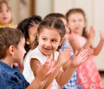 Preschool children clapping